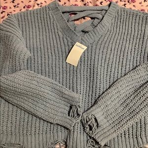 Light blue distressed sweater